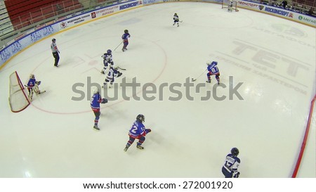 MOSCOW, RUSSIA - APRIL 26, 2014: Game of hockey among childrens teams at the Ice Palace of Sports Sokolniki, aerial view