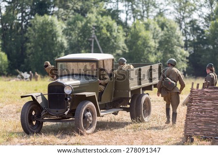NELIDOVO, RUSSIA- JULY 12, 2014: Battlefield 2014: Soviet army truck and the soldiers