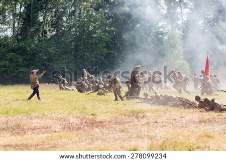 NELIDOVO, RUSSIA- JULY 12, 2014: Battlefield 2014: Red Army soldiers in the attack