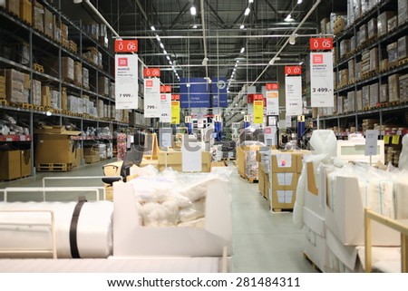 MOSCOW - MAY 21, 2014: Self storage with the packaged products in a shopping center Ikea in Moscow