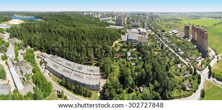 RUSSIA, MOSCOW -?? JUL 13, 2014: Panorama of equestrian arena Sozidatel after Russian Championship for Dzhigitovka at sunny summer day. Aerial view. (Photo with noise from action camera)