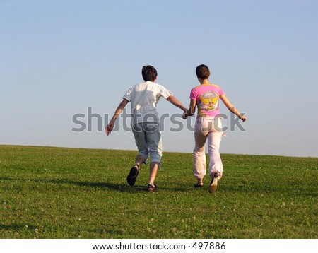 running couple back sky grass