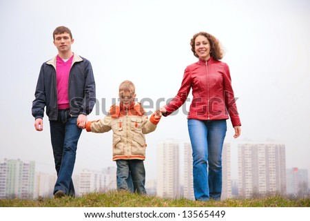 family walk outdoor in city on spring