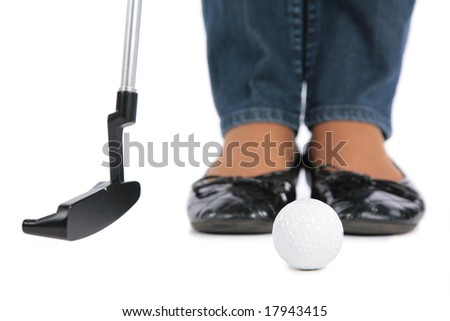 woman Feet, stick and ball for golf