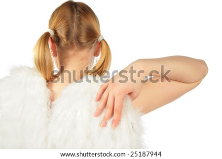 Girl in angel\'s costume from back touches wing