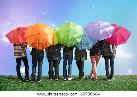 seven friends with rainbow color umbrellas on meadow collage