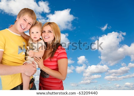 family with boy on White, fluffy clouds in blue sky collage