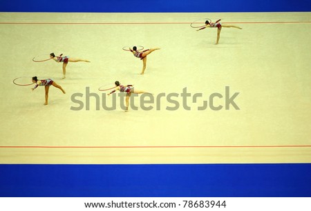MOSCOW - SEPTEMBER 25: Display of artistic gymnastics hoop on September 25, 2010 in Moscow, Russia. 30th rhythmic gymnastics world championships was held in Moscow in sports complex Olympiysky