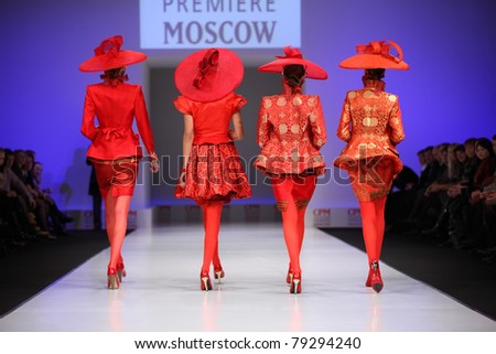 MOSCOW - FEBRUARY 22: Models show the backs of four suits from Slava Zaytzev and walk catwalk in Collection Premiere Moscow, fashion industry platform of IGEDO Company, on February 22, 2011 in Moscow, Russia.