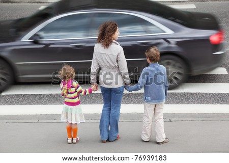 Similar – Image, Stock Photo Mother and son crossing a bridge together