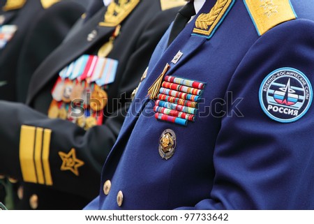 MOSCOW - MAY 8: Military awards of veterans at ceremony of wreath laying at tomb of Unknown Soldier at Victory Day celebrations, on May 8, 2011, Moscow, Russia.