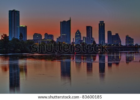 Beautiful Austin skyline reflection on Lady Bird Lake before sunrise