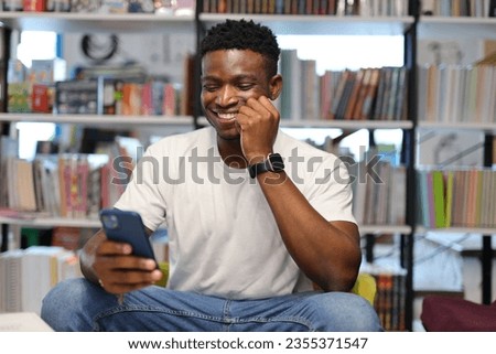 Similar – Image, Stock Photo Handsome Black Man Holding Cup of Wine Smiling Widely Outdoors
