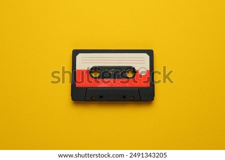 Similar – Image, Stock Photo Compact cassette tapes and cassette recorder. Retro music style. 80s music party. Vintage style. Analog equipment. Stereo sound. Back to the past