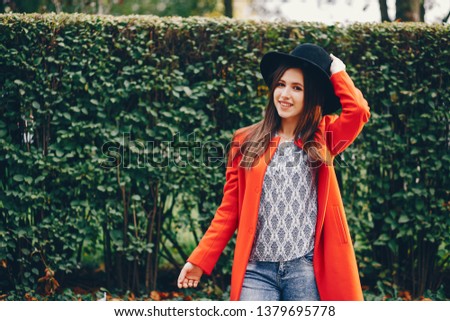 beautiful elegant girl walking around the autumn city  Stok fotoğraf © 