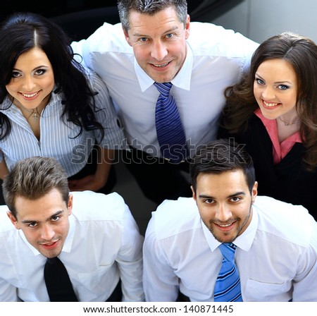 Portrait of smiling business people. Top view