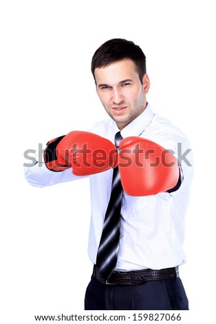 Business man ready to fight with boxing gloves - isolated over white background