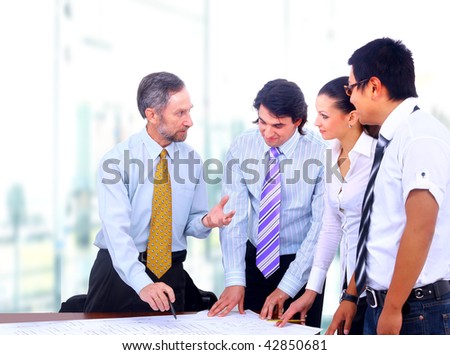 Happy successful business people in a meeting