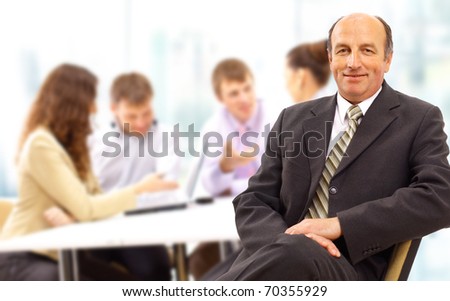 Portrait of confident and successful team of business men smiling