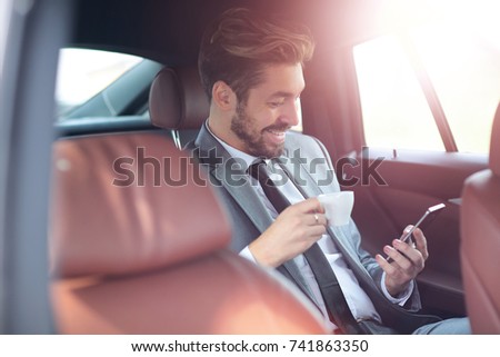 Similar – Image, Stock Photo Concentrated male passenger using laptop in train