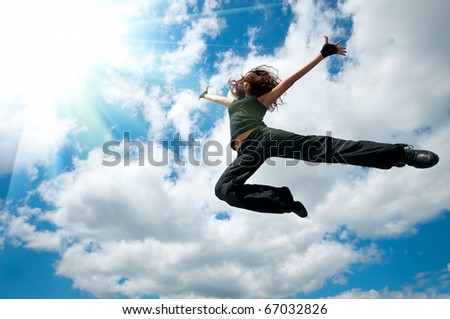 High jump over blue sky and sun