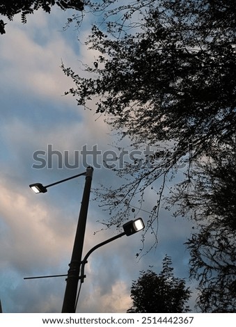 Similar – Foto Bild Straßenlampe und blauer Himmel auf der Straße