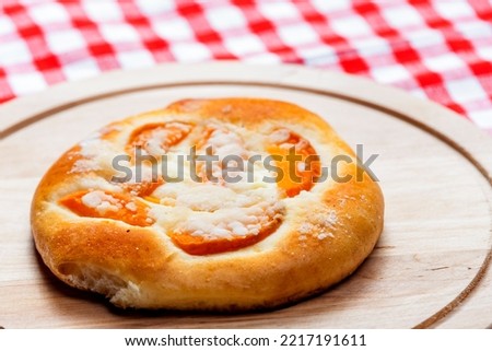 Similar – Image, Stock Photo Apricot pie with one sliced piece. Top view of a lattice crust pie