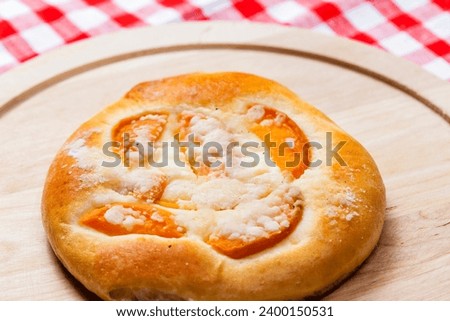 Similar – Image, Stock Photo Apricot pie with one sliced piece. Top view of a lattice crust pie