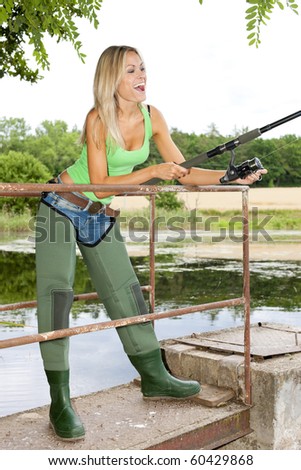 woman fishing at pond