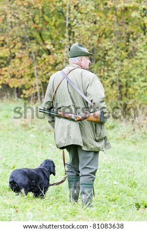 hunter with his dog hunting