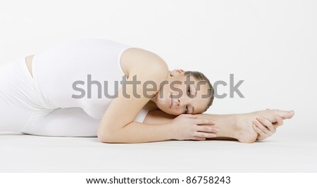 portrait of ballet dancer doing stretching