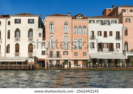 Similar – Image, Stock Photo Serene canal in old city district with aged buildings