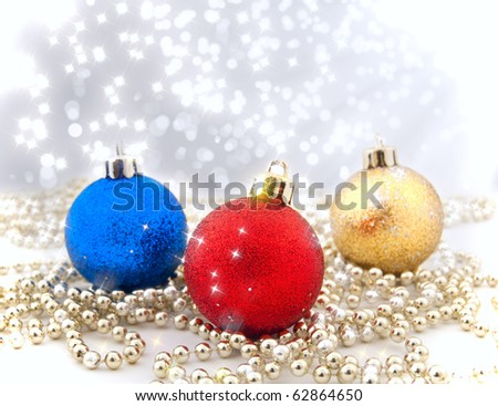 Sparkling Christmas decorations with a background from a bokeh and sparks