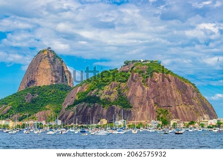 Sugarloaf sugar loaf mountain Pão de Açucar panorama view and cityscape of the Urca village in Rio de Janeiro Brazil. Imagine de stoc © 