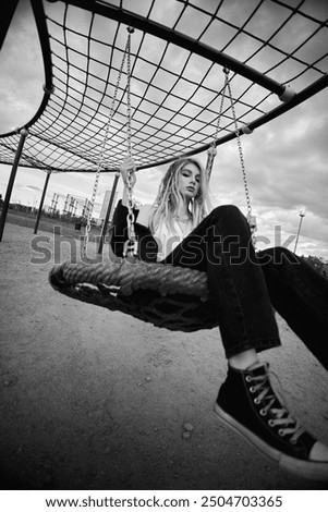 Similar – Image, Stock Photo black chain Tire Swing at a children’s  play ground no people