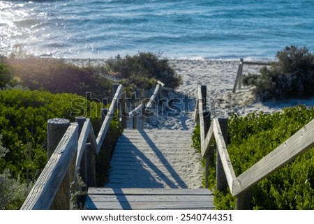 Similar – Foto Bild Holzweg zum Meer auf Sylt an einem Regentag