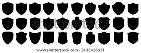 Set of vector shields. Collection of security shield icons. Different shields in black for your design	
