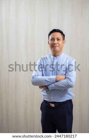 Similar – Image, Stock Photo Asian businessman standing in street