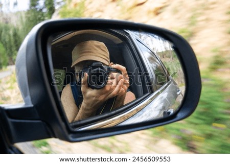 Similar – Image, Stock Photo Male photographer taking picture with camera on street