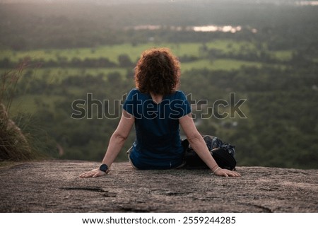 Similar – Image, Stock Photo Female tourist contemplating picturesque landscape