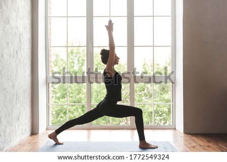 Similar – Image, Stock Photo Woman practicing pilates pose Cobra in park on summer