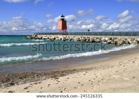 Waves roll in on a fall day at the beach of Charlevoix, Michigan.