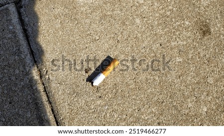 Similar – Image, Stock Photo Filter cigarette lies on a wooden table