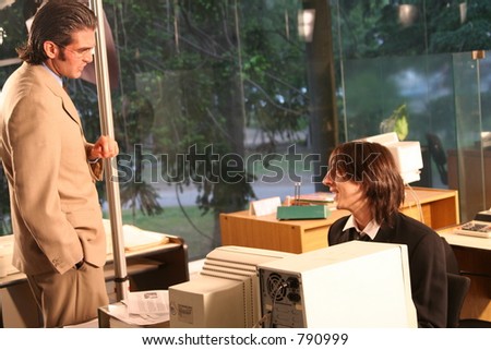 Manager talking to an employee on a movie set