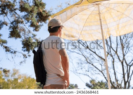 Similar – Foto Bild Gelber Sonnenschirm vor blauem Himmel. Sommer und Urlaub.