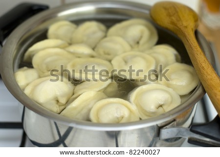 Russian pelmeni meal cooked in a pan