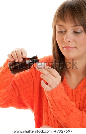 Young woman with cough syrup