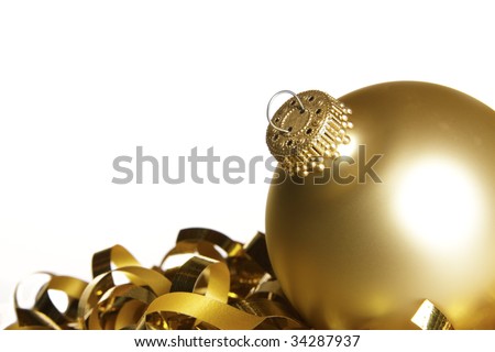 Wonderful gold Christmas ornament on gold ribbon.  Great background.