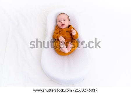 Similar – Image, Stock Photo 3 month old baby doing tummy time; bohemian interior room with houseplants