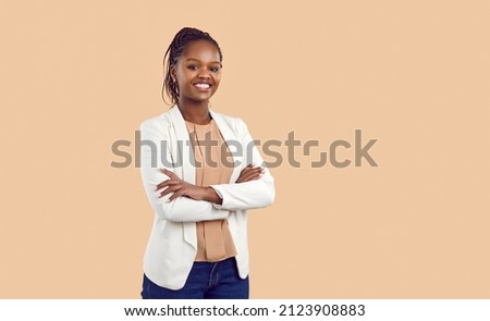 Similar – Image, Stock Photo Happy african young woman with curly hair listening to music on earphones. Hispanic hipster girl dancing to rhythm and singing along melody in the autumn park.